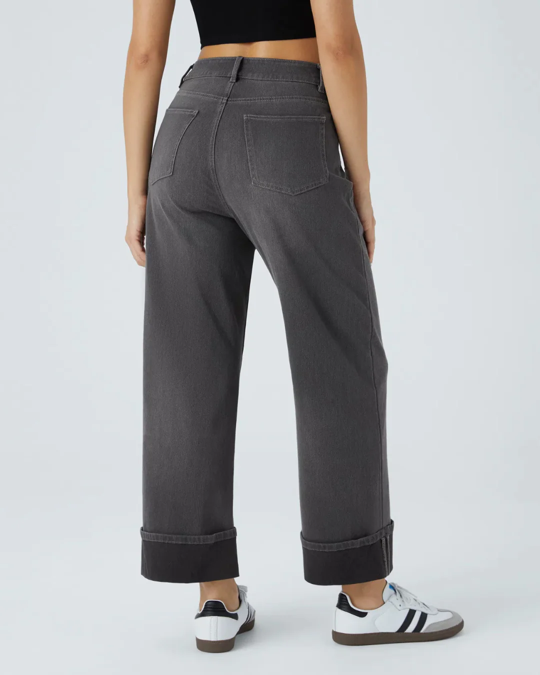 PANTALÓN CON CINTURA ALTA Y BOTAS ANCHAS