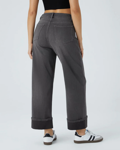 PANTALÓN CON CINTURA ALTA Y BOTAS ANCHAS