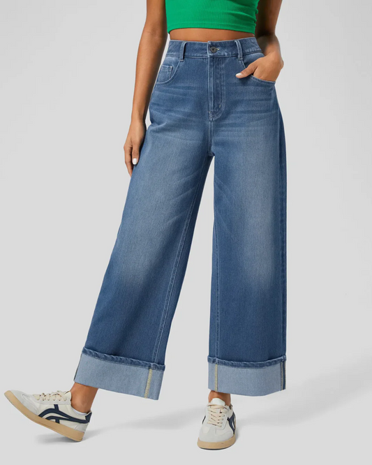PANTALÓN CON CINTURA ALTA Y BOTAS ANCHAS