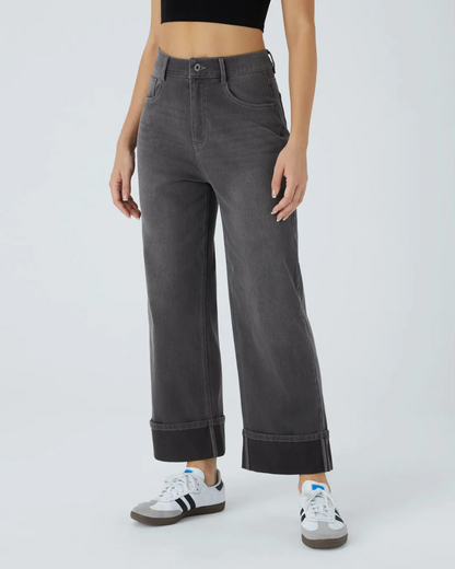 PANTALÓN CON CINTURA ALTA Y BOTAS ANCHAS