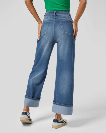 PANTALÓN CON CINTURA ALTA Y BOTAS ANCHAS